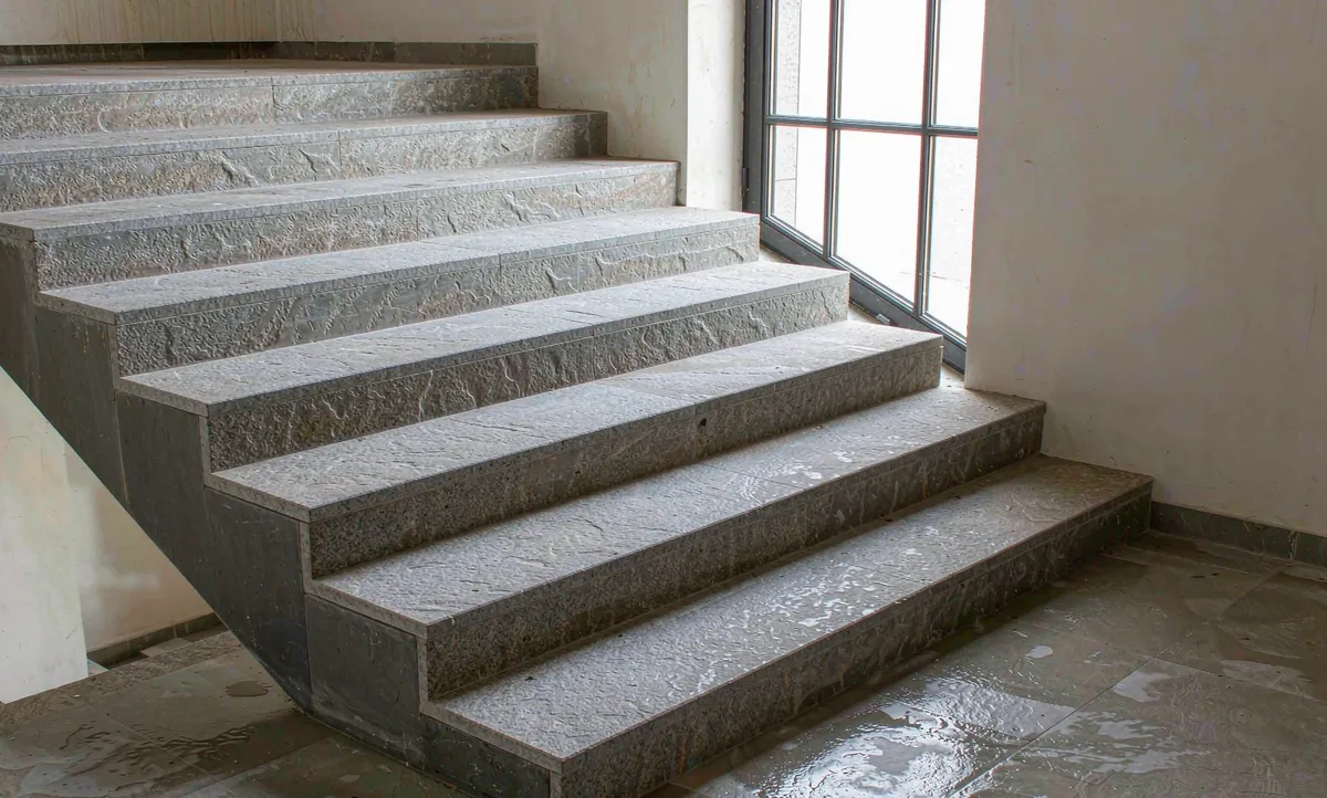 Slip-Resistant Stone Flooring and Stairs: Specifying R-Values and DCOF for Hotels